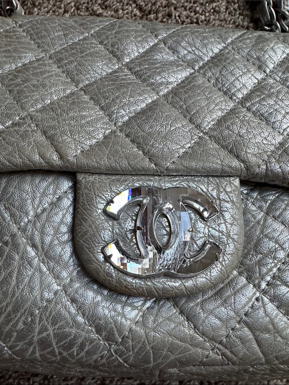 CHANEL Quilted Shoulder Bag in Metallic Gray